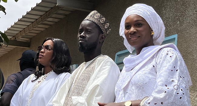 BASSIROU DOMAYE FAYE WITH HIS WIVES.